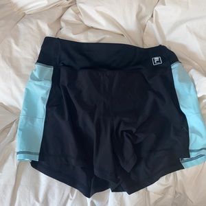 Fila Sport black and aqua athletic shorts.
Lined to bottoms Size medium